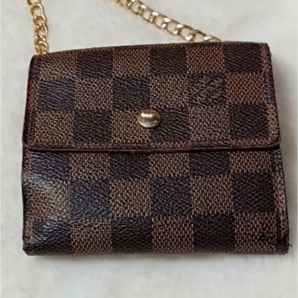 Authentic Louis Vuitton Elise Wallet Good used vintage condition.Signs…